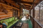 Porch overlooking creek with wood burning fireplace